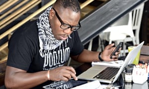A man uses a tablet on November 14, 2012